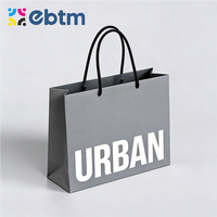 Sacs en papier personnalisés avec logo imprimé, sacs en papier noir de luxe pour vêtements, sacs cadeaux recyclables pour boutique avec ruban et corde