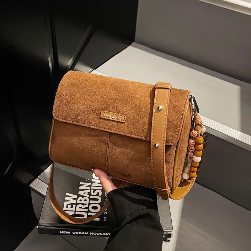 Light brown with pendant