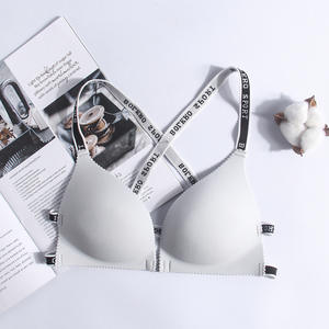 Sujetador deportivo sin costuras para mujer, de talle bajo, push-up, transpirable, con tirantes cruzados en la espalda y diseño de espalda cruzada, con letras en inglés. - Product Image 5