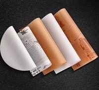 Papier de cuisson en silicone facile à décoller résistant aux hautes températures absorbant l'huile spécifique de cuisine pour le pain enduit à usage alimentaire et industriel