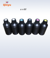 Qinyu tinta Film Transfer DTF UV 500ML 1000ML kualitas tinggi untuk i3200 TX800 XP600 kepala cetak DTF UV
