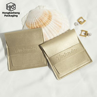 Pochette de rangement à rabat en PU pour bijoux, avec logo personnalisé en relief, sac de rangement tendance pour bijoux, sac d'emballage en PU pour bijoux, prend en charge l'OEM