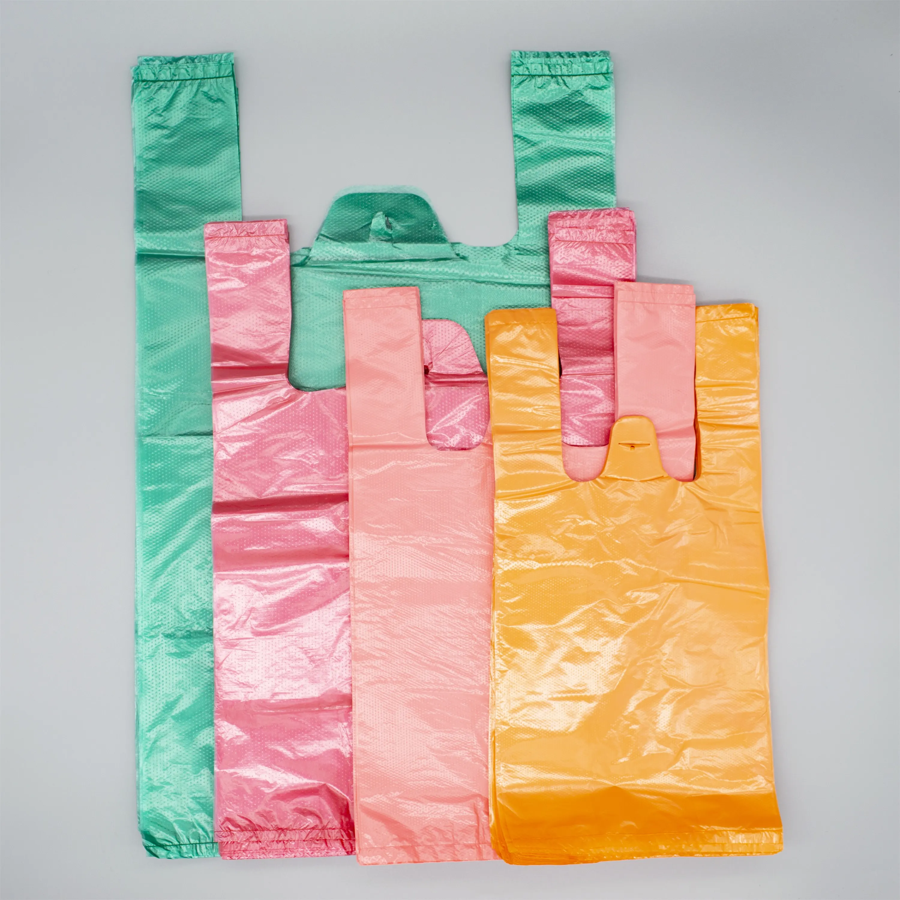 China Manufacturer Customized Color Plastic T-shirt Bag Vest Handle Shopping Bag Carrier Bag