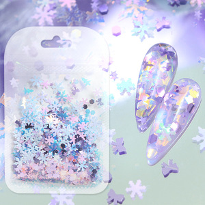 Paillettes pour ongles de Noël violettes scintillantes, flocons de neige, nœuds et décorations d'arbre mélangés, accessoires de manucure élégants - Product Image 1