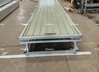 Grande table de culture de plantes d'intérieur mobile avec banc roulant à rail en V pour serre hydroponique