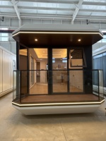 Maison capsule spatiale préfabriquée mobile moderne de luxe avec mécanisme de docking, respectueuse de l'environnement, pour habitation et bureau