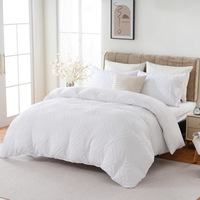 Ensemble de housse de couette trois pièces en polyester 200TC, couleur unie, motif floral découpé, losanges ondulés, pour hôtel et mariage, vente en gros directe usine