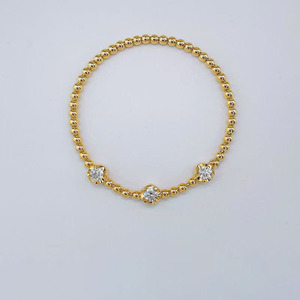 <span class=keywords><strong>Bracelet</strong></span> Élastique Minimaliste et Élégant à Trois Pierres Rondes Polies en Or Jaune 18K avec Diamants de Laboratoire pour Femme – Vente en Gros - Product Image 1