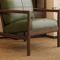Fauteuil lounge en similicuir style Mid-Century avec structure en bois pour salon et hôtel, vente en gros