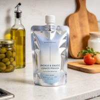 Pochettes souples personnalisables à texture premium avec bec verseur pour sauces, vinaigrettes et légumes marinés, emballage autoportant pour ustensiles de cuisine