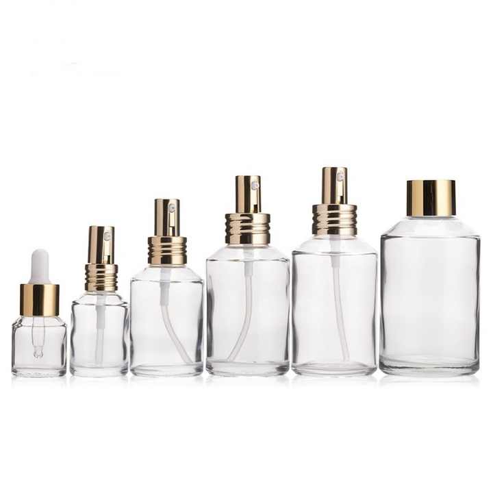 In Stock 15ml 30ml 50ml 100ml Slant Shoulder Clear Glass Face Cream Jars With Gold Cap (GJM07)