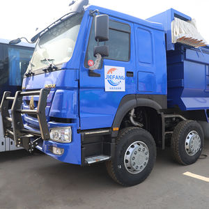 Camion à benne basculante bleu Sinotruk HOWO 8X4 L'acier léger de haute qualité à haute résistance a une forte puissance pour le transport de grosses pierres - Product Image 1