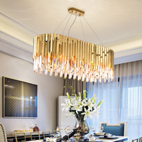 Lustre moderne en cristal doré à plusieurs niveaux, avec lamelles en acier inoxydable, prismes K9 en chevron, cascade, LED dimmable, garantie 3 ans