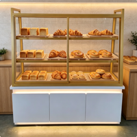 Vitrine de boulangerie commerciale, présentoir à pain en verre avec cadre doré, éclairage LED et rangement inférieur, sur mesure pour boulangerie