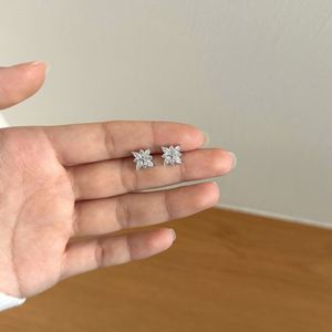 Dylam <b>Fine</b> Stylish Rhodium Plated 925 Sterling Silver Non Tarnish 5A Zirconia Snowflake Shape <b>Stud</b> <b>Earrings</b> for Women - Product Image 4
