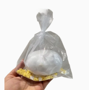 Jouet anti-stress géant en forme de fromage transparent, souple et compressible, avec garniture jaune-orange, emballage plastique - Product Image 2