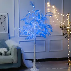 Alberi artificiali illuminati blu per la decorazione del festival Indoor di natale