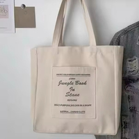 Vente d'usine avec logo personnalisé, sac fourre-tout en coton recyclable et personnalisable, tendance et très demandé, pour un cadeau élégant
