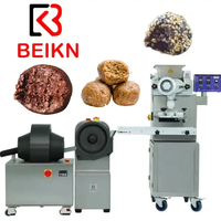 Machine de production de boules de collation entièrement automatique, machine à fabriquer des boules de collation Energy Bliss, machine à fabriquer des boules de dattes à la noix de coco, machine à enrober, machine à fabriquer des boules de protéines