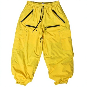 Pantalones de Nieve Unisex Amarillos, Resistentes al Viento, de Secado Rápido, con Bolsillos con Cremallera, Impermeables 10,000mm, con Calefacción y Cordón Ajustable - Product Image 1