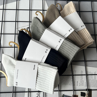 Emballage personnalisé Logo blanc unisexe Crew chaussettes femmes mi-longueur chaussettes Ins tricot rue minimaliste chaussettes de sport homme