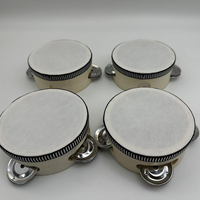 Vente en gros du tambourin en peau de mouton simili de 4 pouces, le plus vendu, pour l'accompagnement Orff et comme cadeau de mariage, à prix très raisonnable.