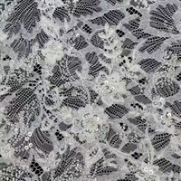 Tissu en dentelle française perlée avec des paillettes et des perles 100% polyester
