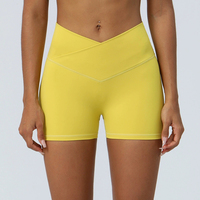 Shorts de yoga rehausseurs de hanches en gros, shorts de course et de fitness extensibles à taille haute, pantalons moulants à taille croisée