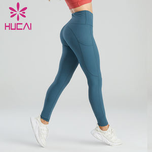 Ropa de entrenamiento personalizada para mujer, mallas de Yoga de cintura alta con bolsillos de gimnasio de color sólido para mujer - Product Image 1