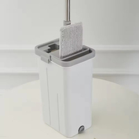 Sistema de limpieza de suelos para el hogar: Set de cubo y fregona giratoria 360° con escurridor manos libres, palo de acero plano y microfibra 70-80%