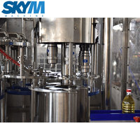 Ligne de production automatique de mise en bouteille d'huile d'olive, machine de remplissage et de scellage d'huile végétale
