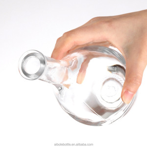 Bottiglia <span class=keywords><strong>di</strong></span> <span class=keywords><strong>Vetro</strong></span> per Brandy XO da 500ml/750ml a Forma <span class=keywords><strong>di</strong></span> Goccia d'Acqua con Superficie Ondulata Bianca Trasparente Sigillata con Tappo in Sughero per Vini e Distillati - Product Image 4