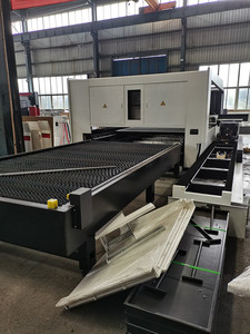 Cnccolgar 6KW bảo hiểm đầy đủ kèm theo máy cắt laser sợi <span class=keywords><strong>CNC</strong></span> với bàn trao đổi và máy cắt ống 6M - Product Image 5