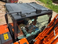 Excavatrice sur pneus d'occasion Hitachi ZX 130 de 13 tonnes, 98% neuve, excellente qualité, en stock