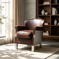 Fauteuil club en cuir style aviateur, fauteuil industriel avec coque en aluminium et rivets, couleur cognac marron, pour salon ou hôtel