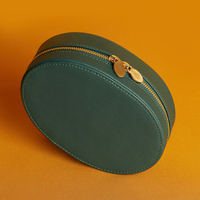 Petit étui organisateur ovale zippé végétalien de haute qualité boîte à bijoux de voyage en cuir de qualité supérieure avec fermeture éclair