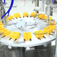 Machine de sertissage rotative à double buses de haute précision pour le remplissage automatique de parfum et d'huile, moteur personnalisé