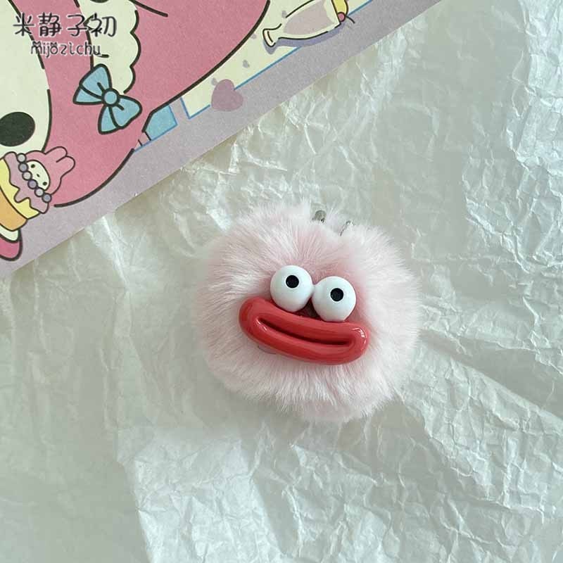 Porte-clés pompon bouche de saucisse rose