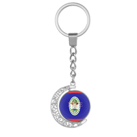 Porte-clés pivotant personnalisé en forme de croissant de lune, en alliage ajouré avec cabochon en verre rotatif affichant le drapeau de Montserrat
