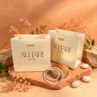 Sac de shopping en papier crème de luxe avec impression de logo personnalisé pour bijoux, emballage cadeau, présentation de bijoux