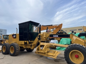 Niveleuse d'occasion CAT 140K, faible nombre d'heures de fonctionnement, cabine climatisée, système hydraulique stable, supporte l'expédition mondiale - Product Image 1
