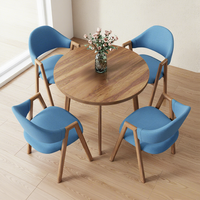 Ensemble de table et de chaises de salle à manger en marbre européen moderne et durable, mobilier de restaurant pour usage commercial