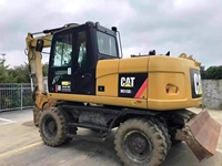 Pelle sur pneus Cat M315d2 M315D 315D2 Pelle sur pneus Caterpillar 315 312 d'occasion à vendre