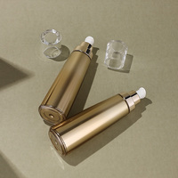 Flacon conique acrylique de 130ml bouteille de lotion en plastique dorée pompe à pression emballage cosmétique bouteille de sérum de soins de la peau en spray