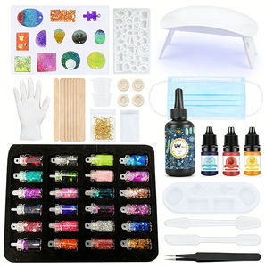Kit de résine UV à séchage rapide pour bijoux avec moules en silicone époxy transparents, pendentifs, boucles d'oreilles, porte-clés, outils à paillettes et feuilles de métal. - Product Image 1