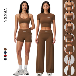 Ensemble de sport et yoga pour femme, couleurs contrastées, avec soutien-gorge à coussinets amovibles, haut confortable et leggings taille haute effet galbe, pantalon large polyvalent - Product Image 1