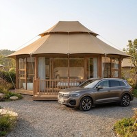 Tente de glamping de luxe avec membrane tensile en PVDF 1050g et mur en verre à rupture de pont thermique, idéale pour hôtels, éco-resorts et séjours en montagne.