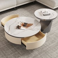 Table basse et meuble TV combinés en panneaux de roche ronds, style luxe léger italien, pour petits espaces domestiques, design moderne et simple