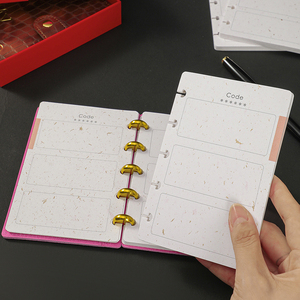 Papel <span class=keywords><strong>de</strong></span> libro <span class=keywords><strong>de</strong></span> código <span class=keywords><strong>de</strong></span> encuadernación <span class=keywords><strong>de</strong></span> disco organizado con impresión <span class=keywords><strong>de</strong></span> dos colores recargable personalizada, 30 hojas <span class=keywords><strong>de</strong></span> papel <span class=keywords><strong>de</strong></span> recarga <span class=keywords><strong>de</strong></span> libro <span class=keywords><strong>de</strong></span> contraseña con agujero <span class=keywords><strong>De</strong></span> Seta - Product Image 1