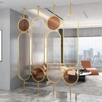 Paravent en métal moderne de luxe rotatif avec design découpé au laser pour salon